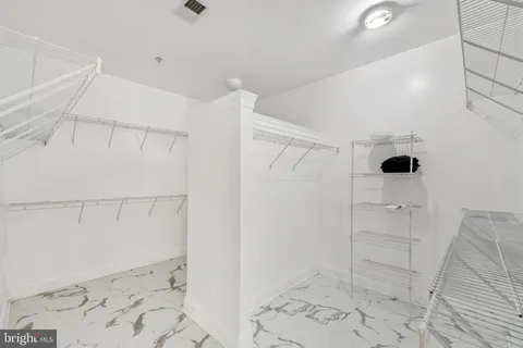 a bathroom with a shower and toilet