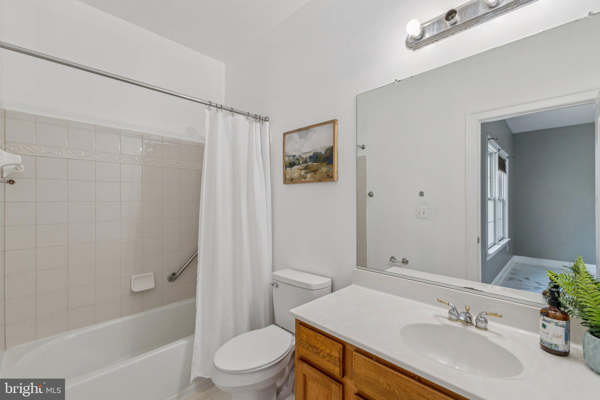 2205 Dhow Court Bowie, MD 20721 - Photo 27 of 40 a bathroom with a sink toilet and shower