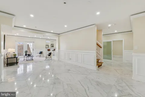 a view of a livingroom with gym equipment