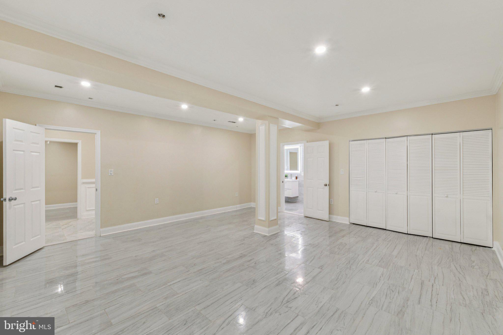 2205 Dhow Court Bowie, MD 20721 - Photo 35 of 40 a view of an empty room with wooden floor