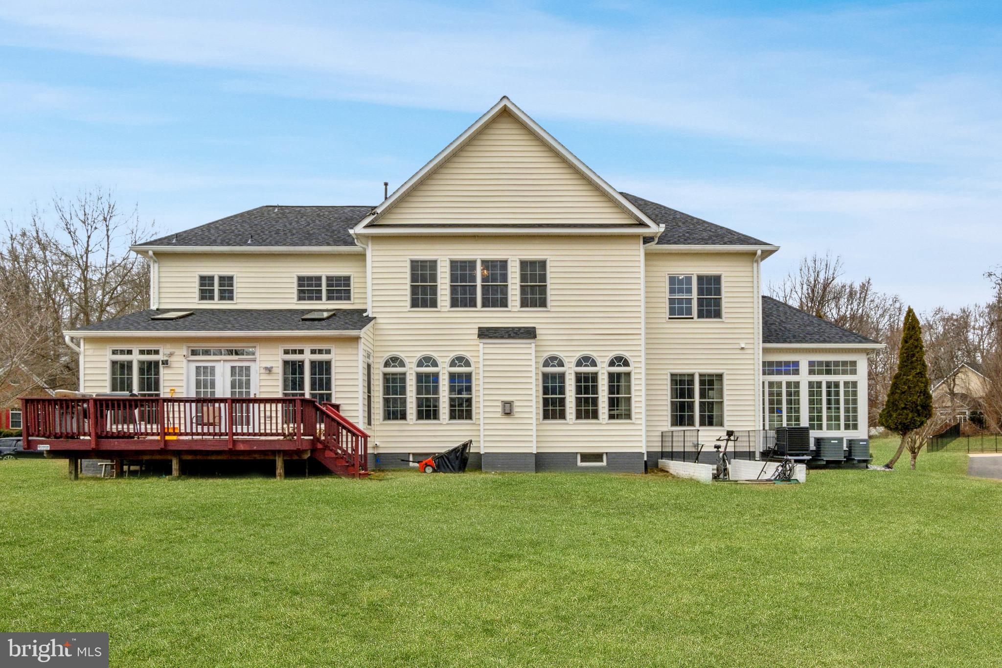 2205 Dhow Court Bowie, MD 20721 - Photo 40 of 40 a front view of a house with a yard and trees