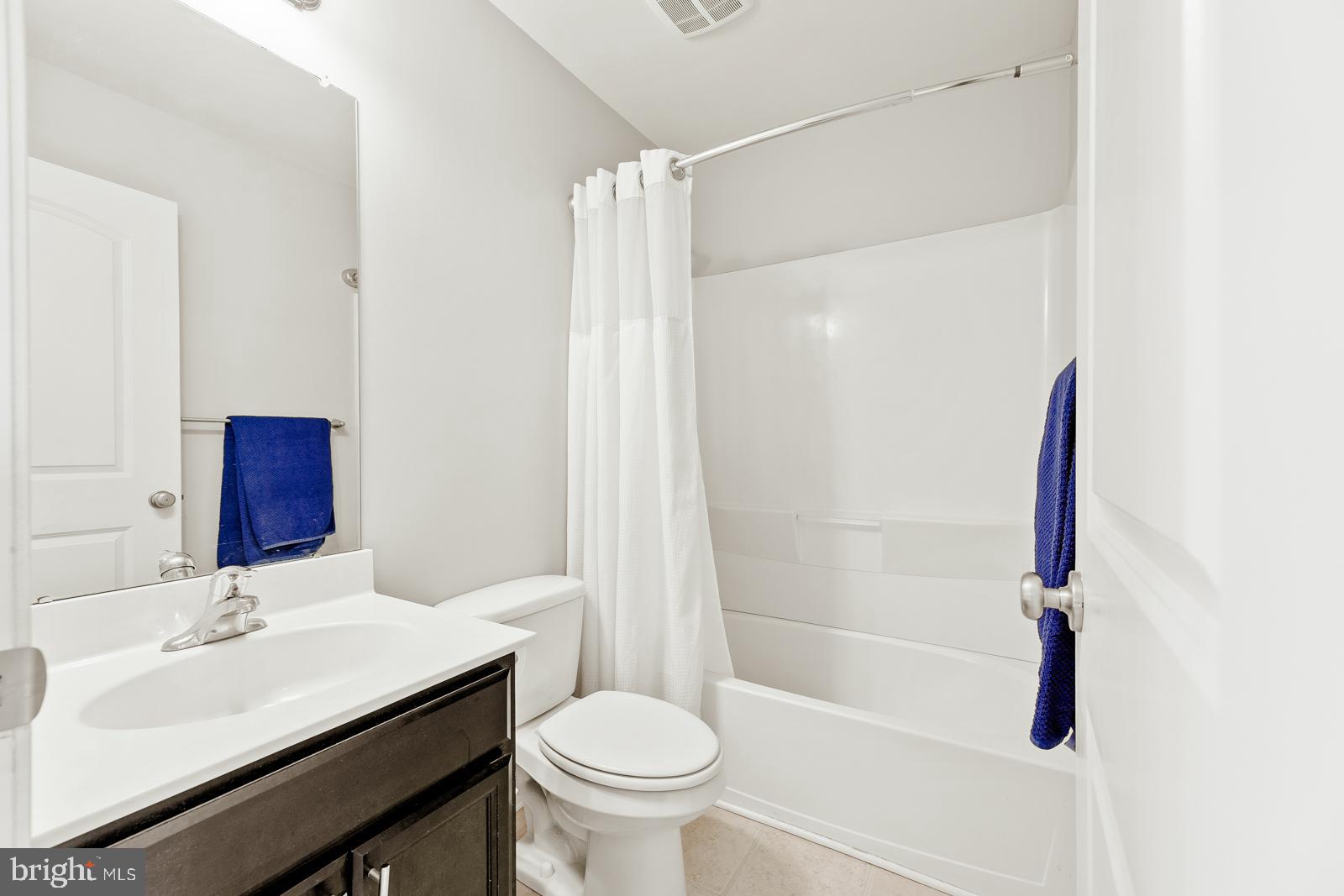 3669 Jacob Stout Road, Unit 8 Doylestown, PA 18902 - Photo 20 of 38 a bathroom with a sink toilet and shower
