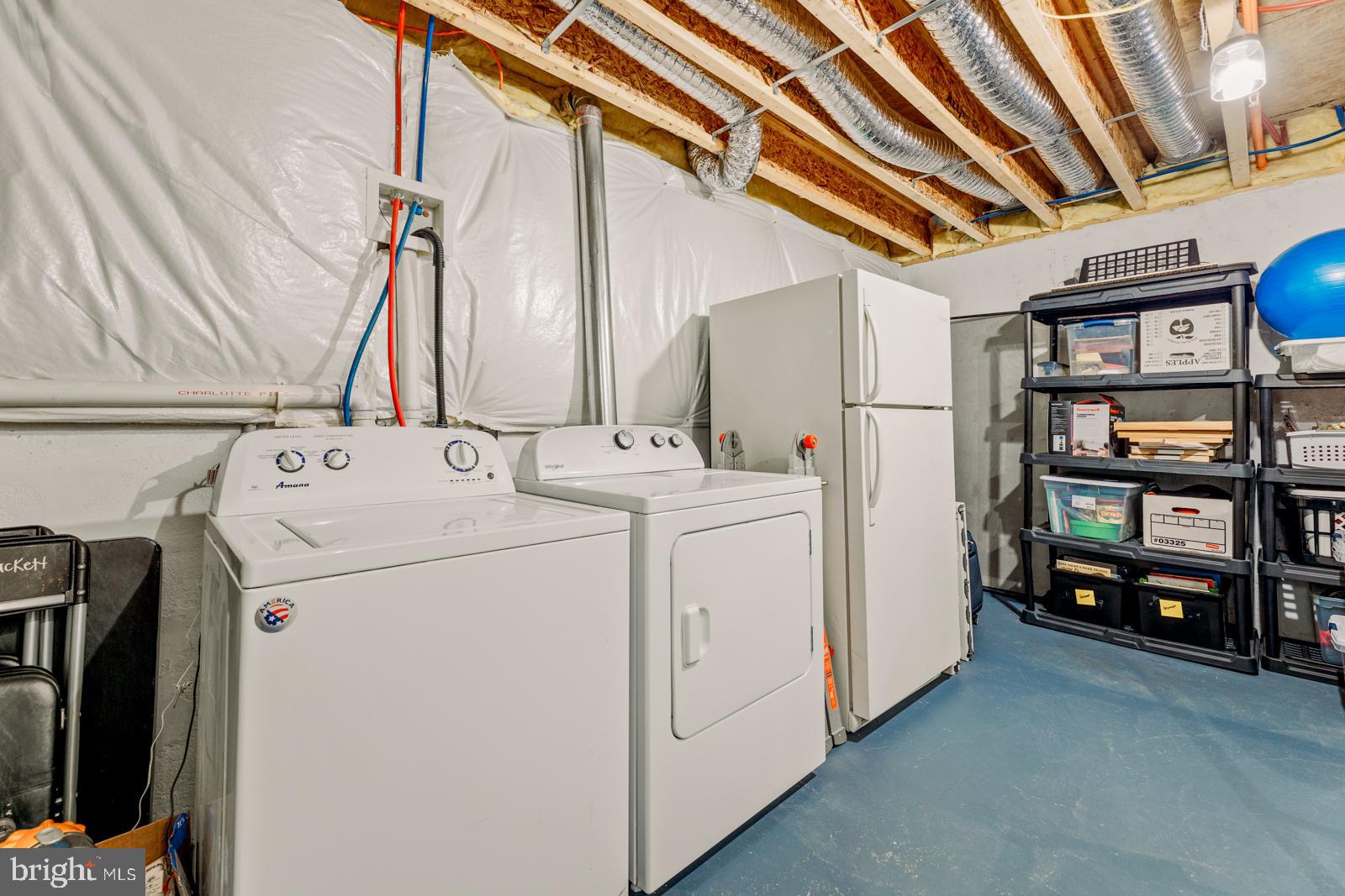 3669 Jacob Stout Road, Unit 8 Doylestown, PA 18902 - Photo 31 of 38 a utility room with dryer and washer