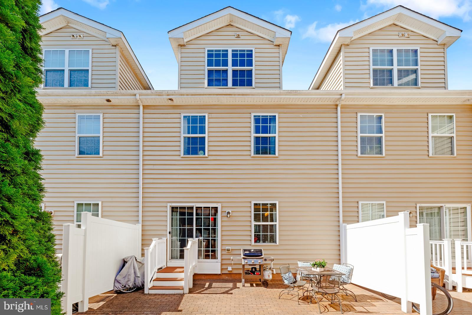 3669 Jacob Stout Road, Unit 8 Doylestown, PA 18902 - Photo 32 of 38 a backyard of a house with outdoor seating