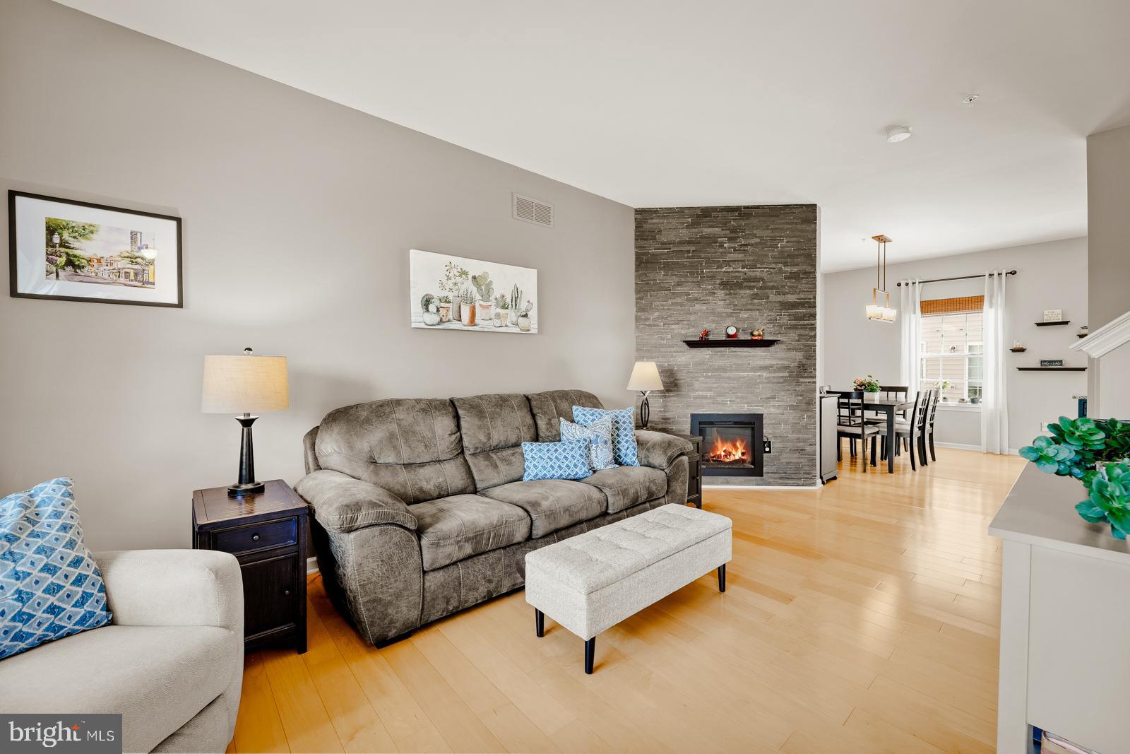 3669 Jacob Stout Road, Unit 8 Doylestown, PA 18902 - Photo 4 of 38 a living room with furniture and a fireplace