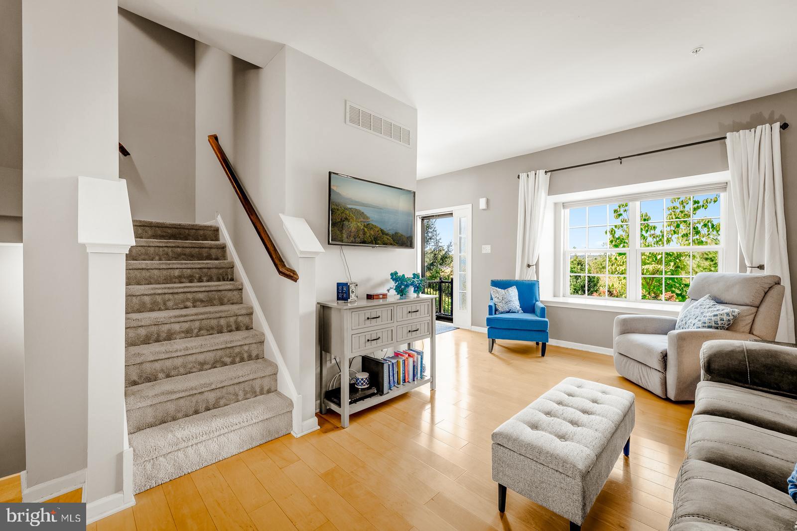 3669 Jacob Stout Road, Unit 8 Doylestown, PA 18902 - Photo 6 of 38 a living room with furniture and a fireplace