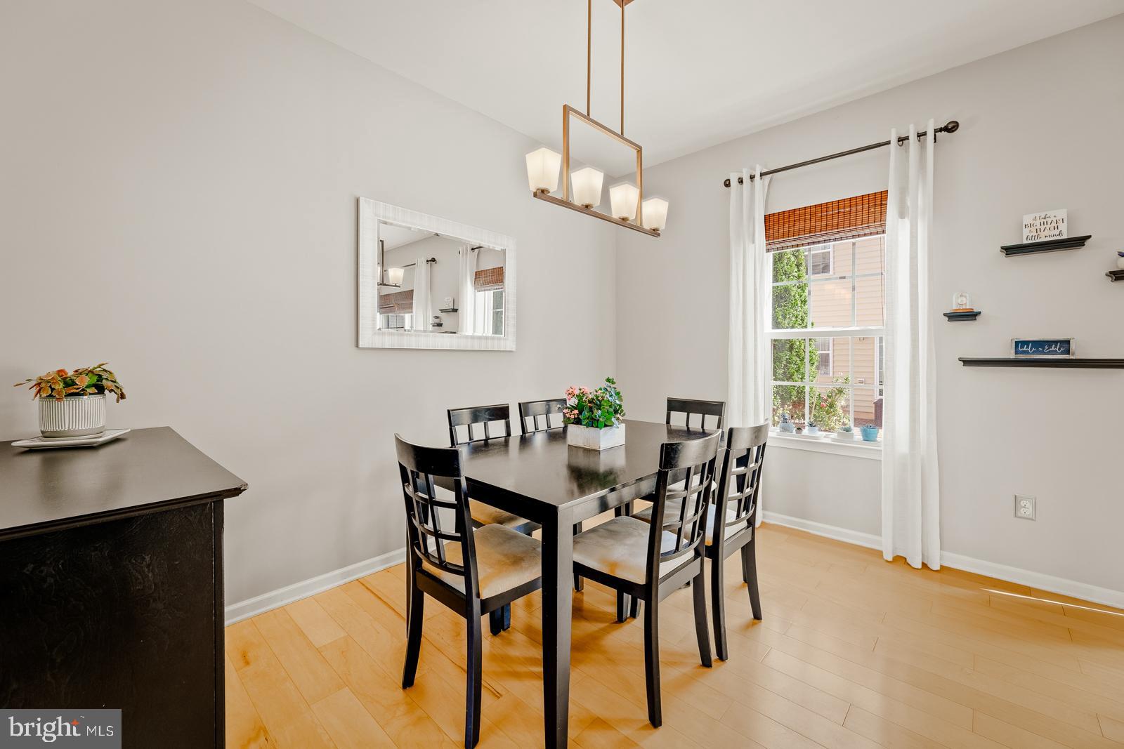 3669 Jacob Stout Road, Unit 8 Doylestown, PA 18902 - Photo 7 of 38 a view of a dining room with furniture window and outside view