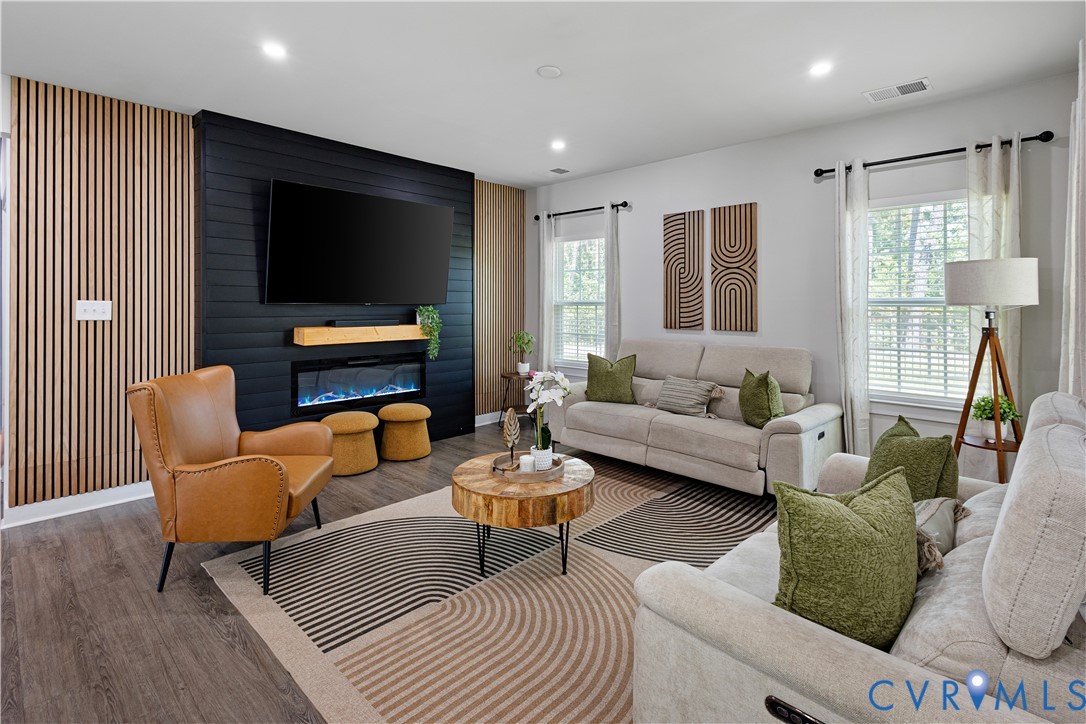 4818 Stavely Road Chester, VA 23831 - Photo 10 of 36 Accent wall with electric insert fireplace