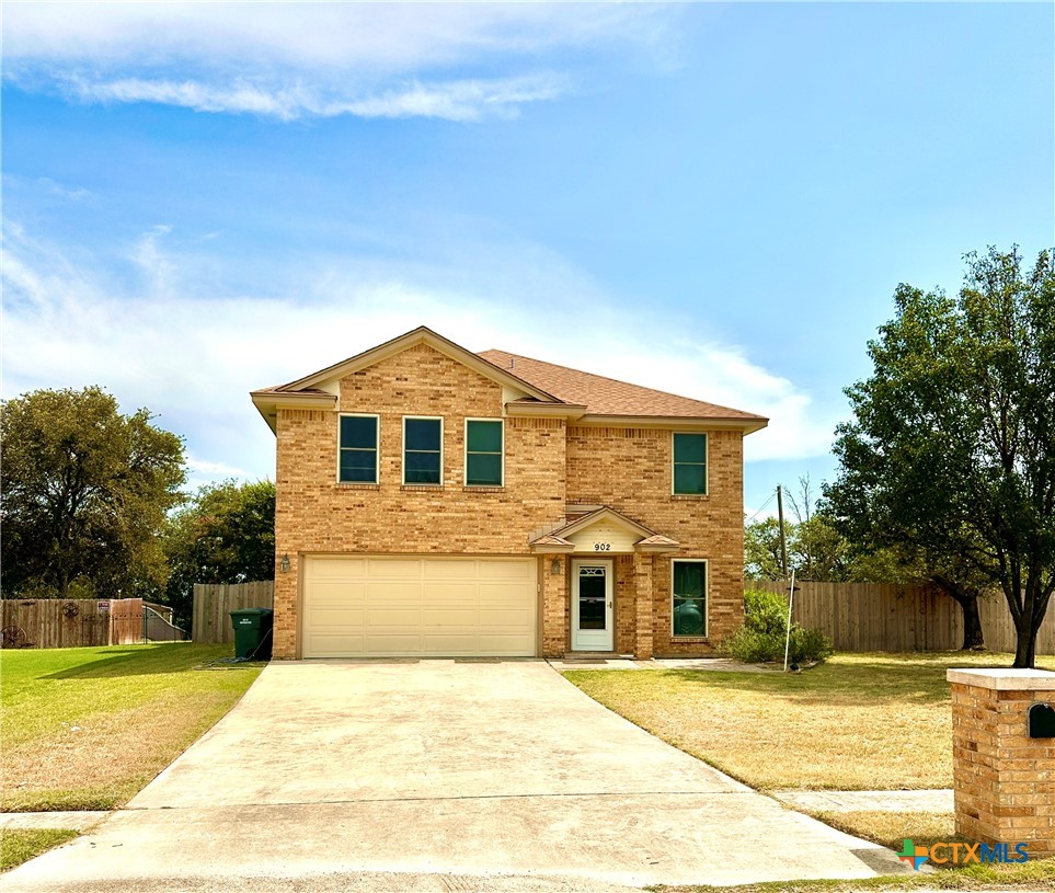 902 Tank Street Copperas Cove, TX 76522 - Photo 1 of 1 a front view of a house with a yard