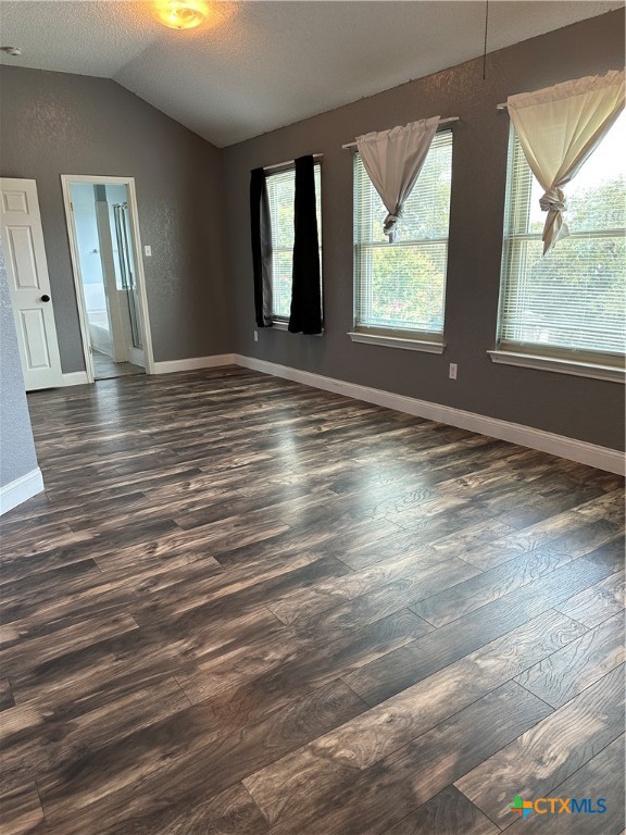 902 Tank Street Copperas Cove, TX 76522 - Photo 13 of 27 a view of an empty room with wooden floor and a window