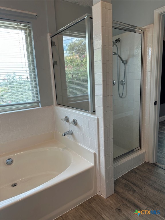 902 Tank Street Copperas Cove, TX 76522 - Photo 14 of 27 a white bath tub sitting next to a shower