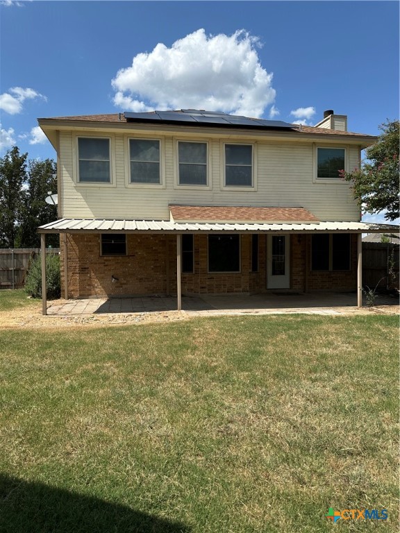 902 Tank Street Copperas Cove, TX 76522 - Photo 25 of 27 a front view of a house with a garden