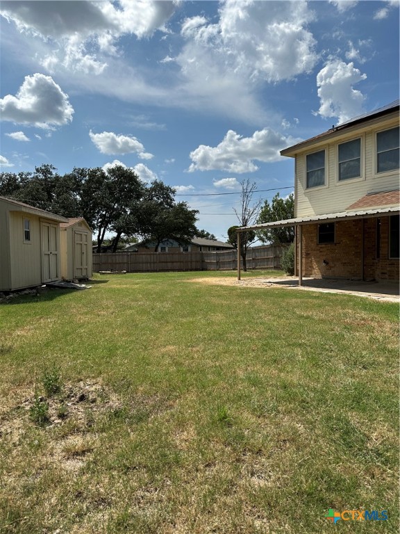 902 Tank Street Copperas Cove, TX 76522 - Photo 26 of 27 a swimming pool with outdoor seating and yard