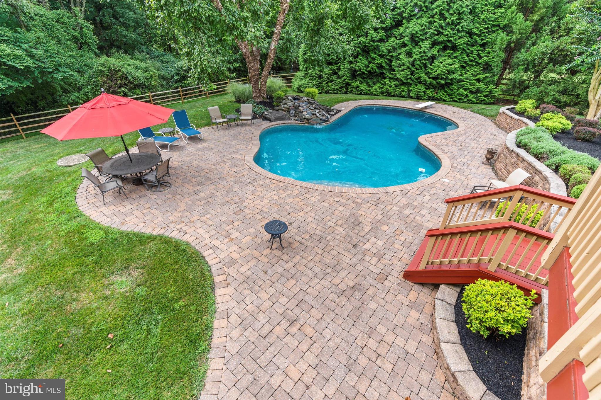 204 Fern Ridge Landenberg, PA 19350 - Photo 62 of 81 Stunning View of the Pool with Waterfall