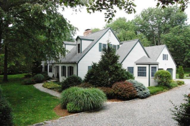 8 Sport Hill Road Redding, CT 06896 - Photo 1 of 1 front view of house with a yard