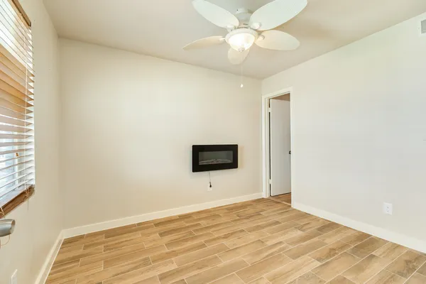 a view of a livingroom with a flat screen tv