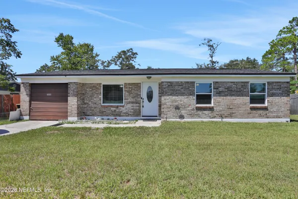 a front view of house with yard