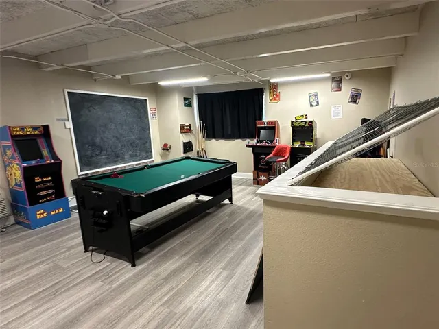 a room with furniture and a flat screen tv