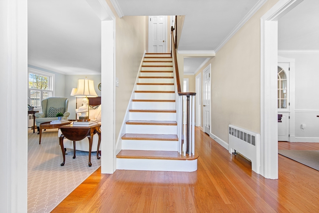 40 Eaton Road Needham, MA 02492 - Photo 3 of 27 a view of entryway and hall with wooden floor