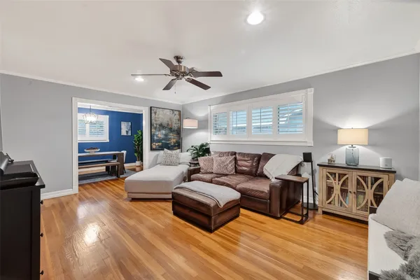 a spacious bathroom with a granite countertop sink and a mirror
