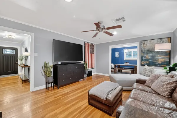 a view of a chairs and table in backyard of the house