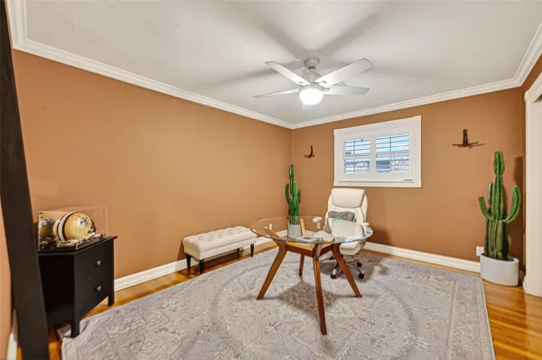 a bathroom with a granite countertop sink a toilet and a mirror
