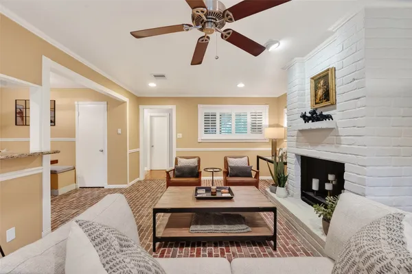 a living room with furniture and a table