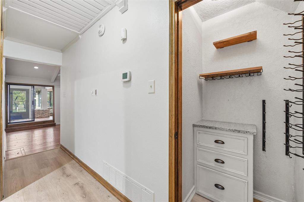 1607 North Main Street Euless, TX 76039 - Photo 23 of 40 a view of a hallway with closet