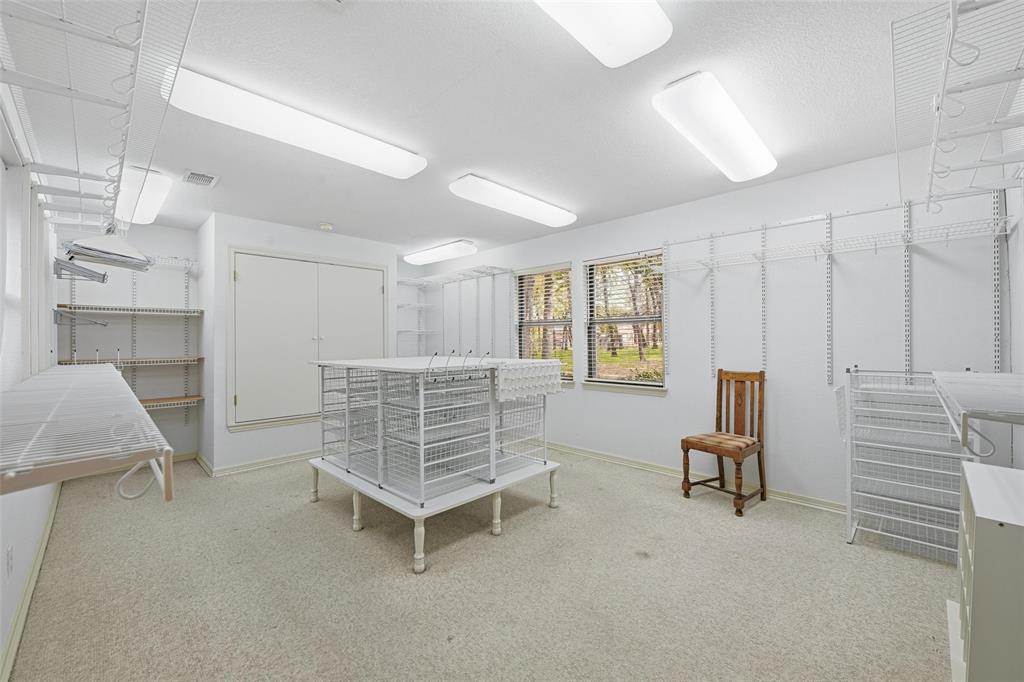 1607 North Main Street Euless, TX 76039 - Photo 30 of 40 a room with furniture and a window