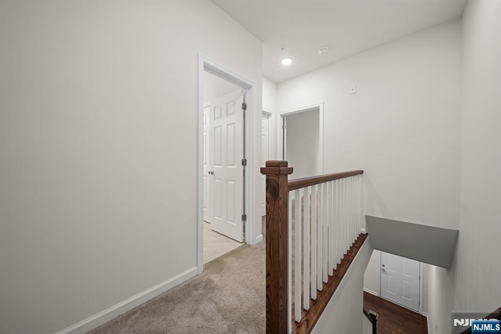 39 Arnold Drive Wood-Ridge, NJ 07075 - Photo 19 of 49 a view of a hallway with a room