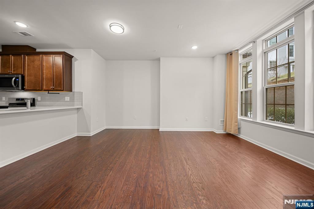 39 Arnold Drive Wood-Ridge, NJ 07075 - Photo 10 of 49 a view of a kitchen with a sink and a window