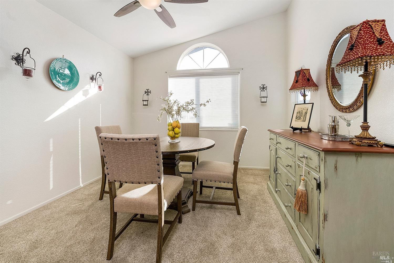 600 Colonial Park Drive Santa Rosa, CA 95403 - Photo 7 of 34 a view of a dining room with furniture and a chandelier