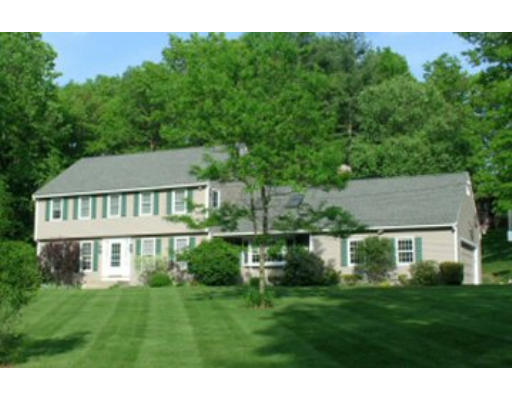4 Old Homestead Road Groton, MA 01450 - Photo 1 of 1 a view of a house with a big yard plants and large trees