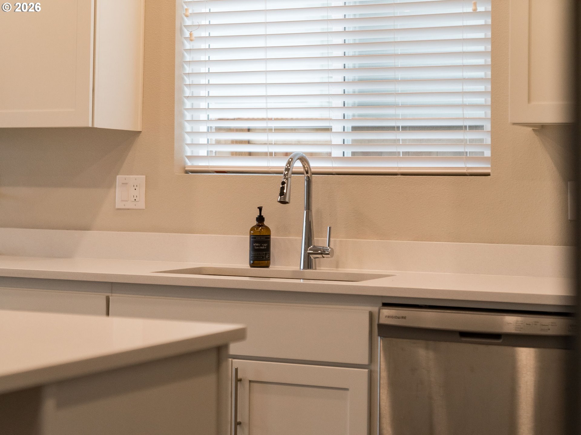 1663 Northwest Edgar Street McMinnville, OR 97128 - Photo 14 of 44 a kitchen with a sink and a window