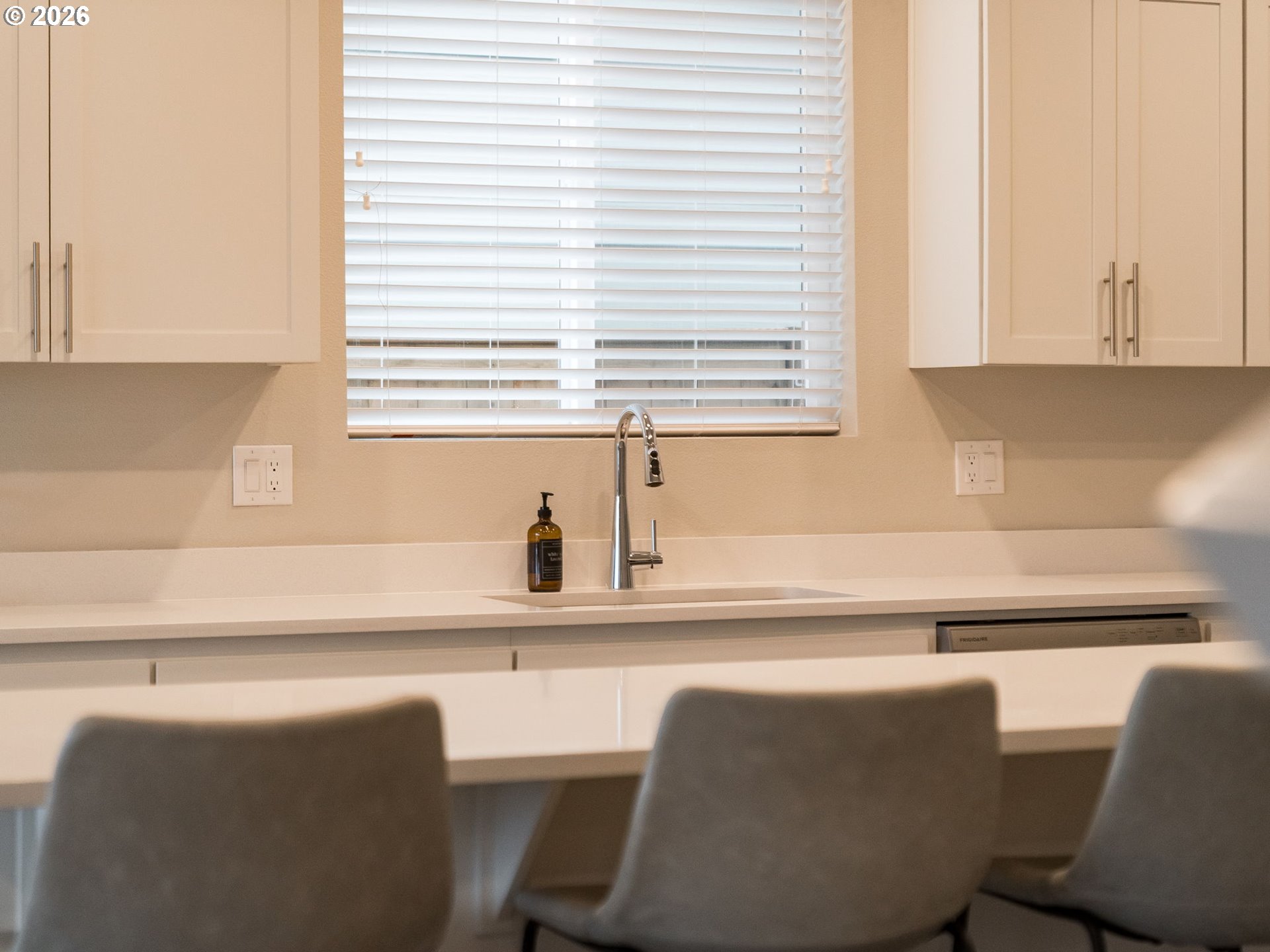 1663 Northwest Edgar Street McMinnville, OR 97128 - Photo 20 of 44 a kitchen with stainless steel appliances cabinets and a window