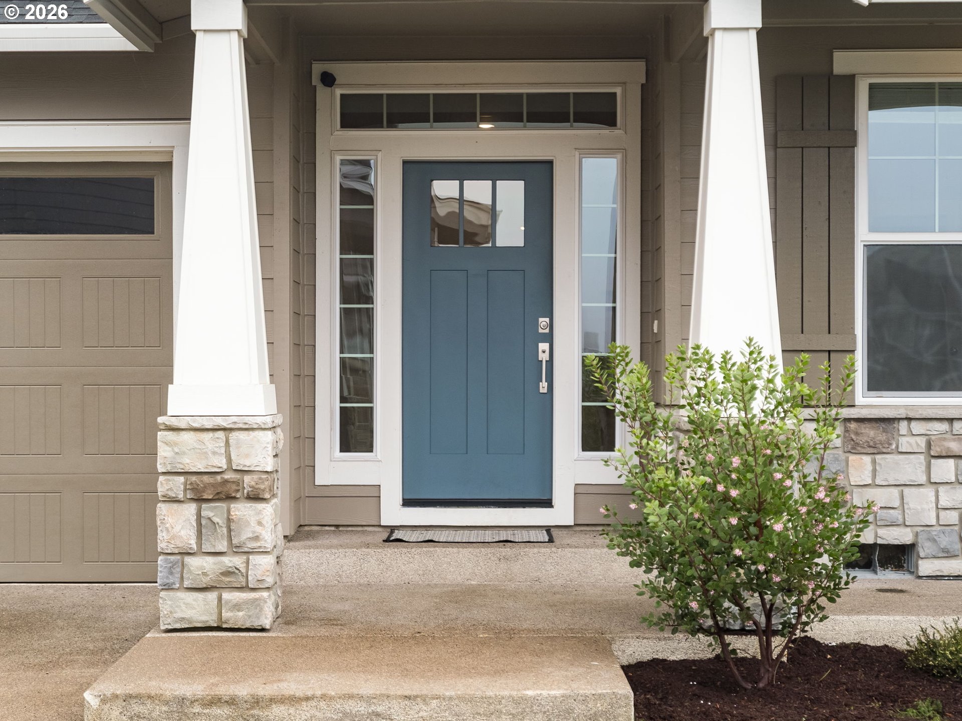 1663 Northwest Edgar Street McMinnville, OR 97128 - Photo 2 of 44 a couple of potted plants in front of a door