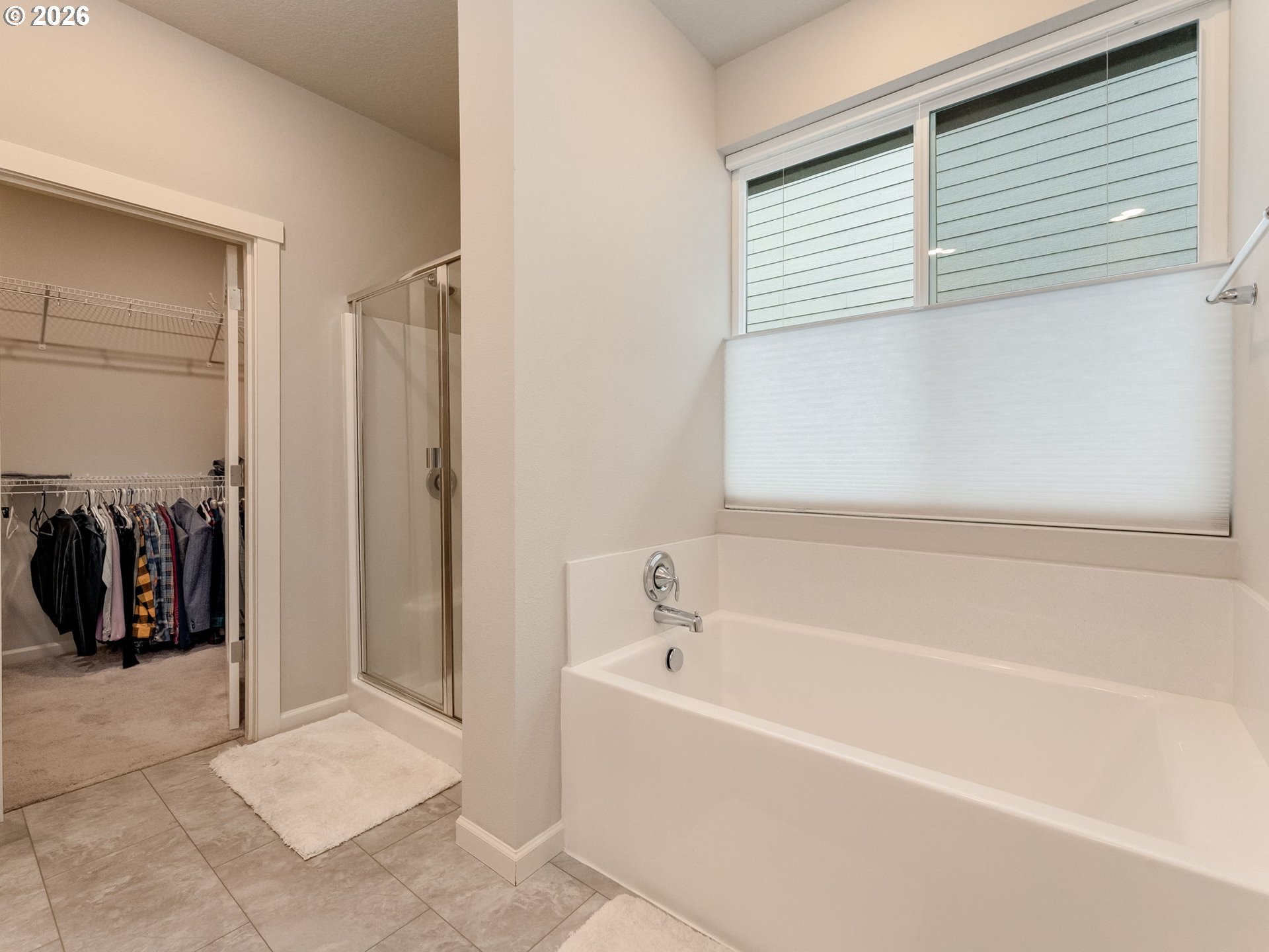 1663 Northwest Edgar Street McMinnville, OR 97128 - Photo 27 of 44 a bathroom with a bathtub and a shower