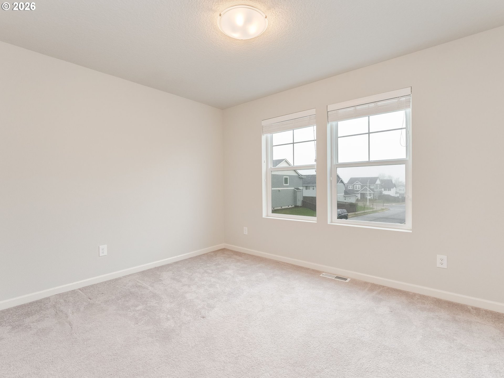 1663 Northwest Edgar Street McMinnville, OR 97128 - Photo 30 of 44 an empty room with a window