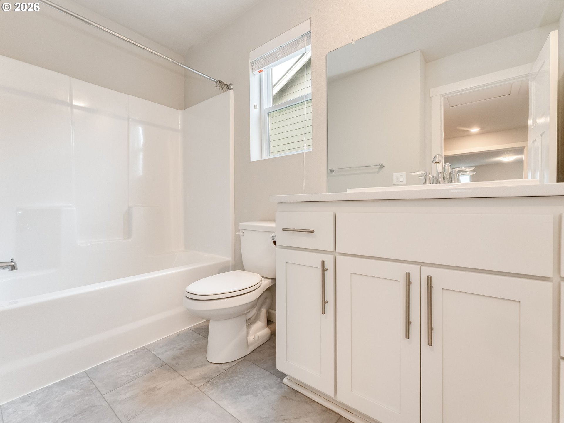 1663 Northwest Edgar Street McMinnville, OR 97128 - Photo 31 of 44 a bathroom with a sink a toilet and a bathtub