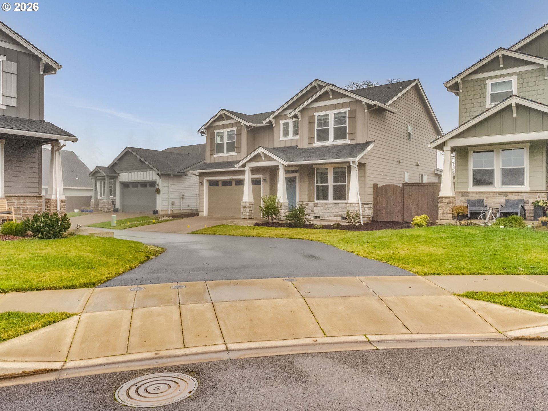 1663 Northwest Edgar Street McMinnville, OR 97128 - Photo 43 of 44 a front view of a house with a yard