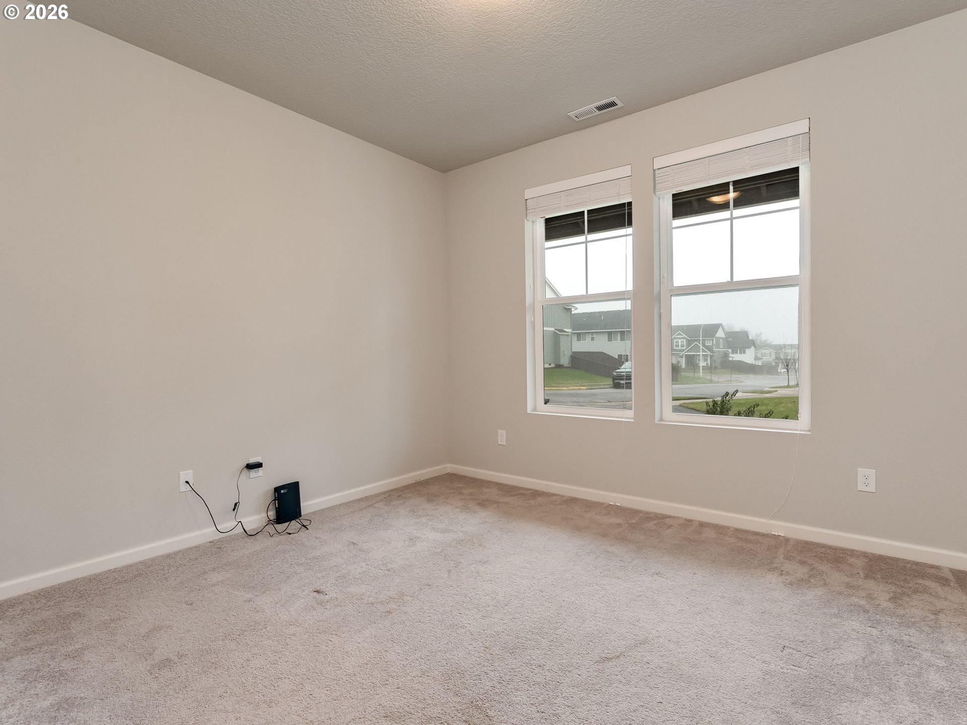 1663 Northwest Edgar Street McMinnville, OR 97128 - Photo 6 of 44 an empty room with a window