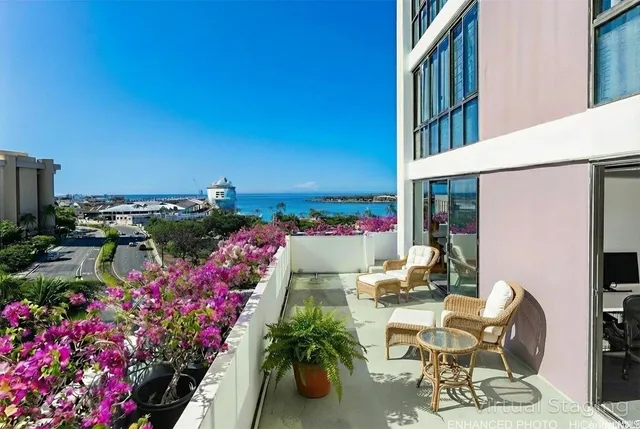 a view of a chairs and table in a patio
