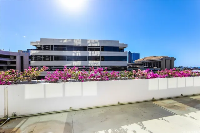 a bedroom with a bed and a desk