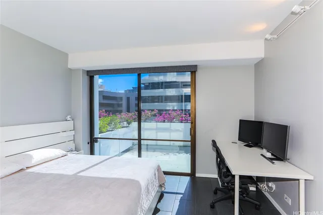 a view of a swimming pool with a lounge chairs