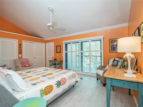 a bedroom with bed and a window