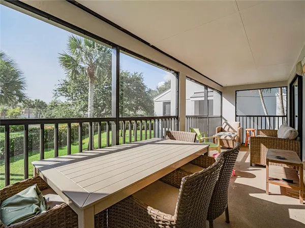 a view of a balcony dining area