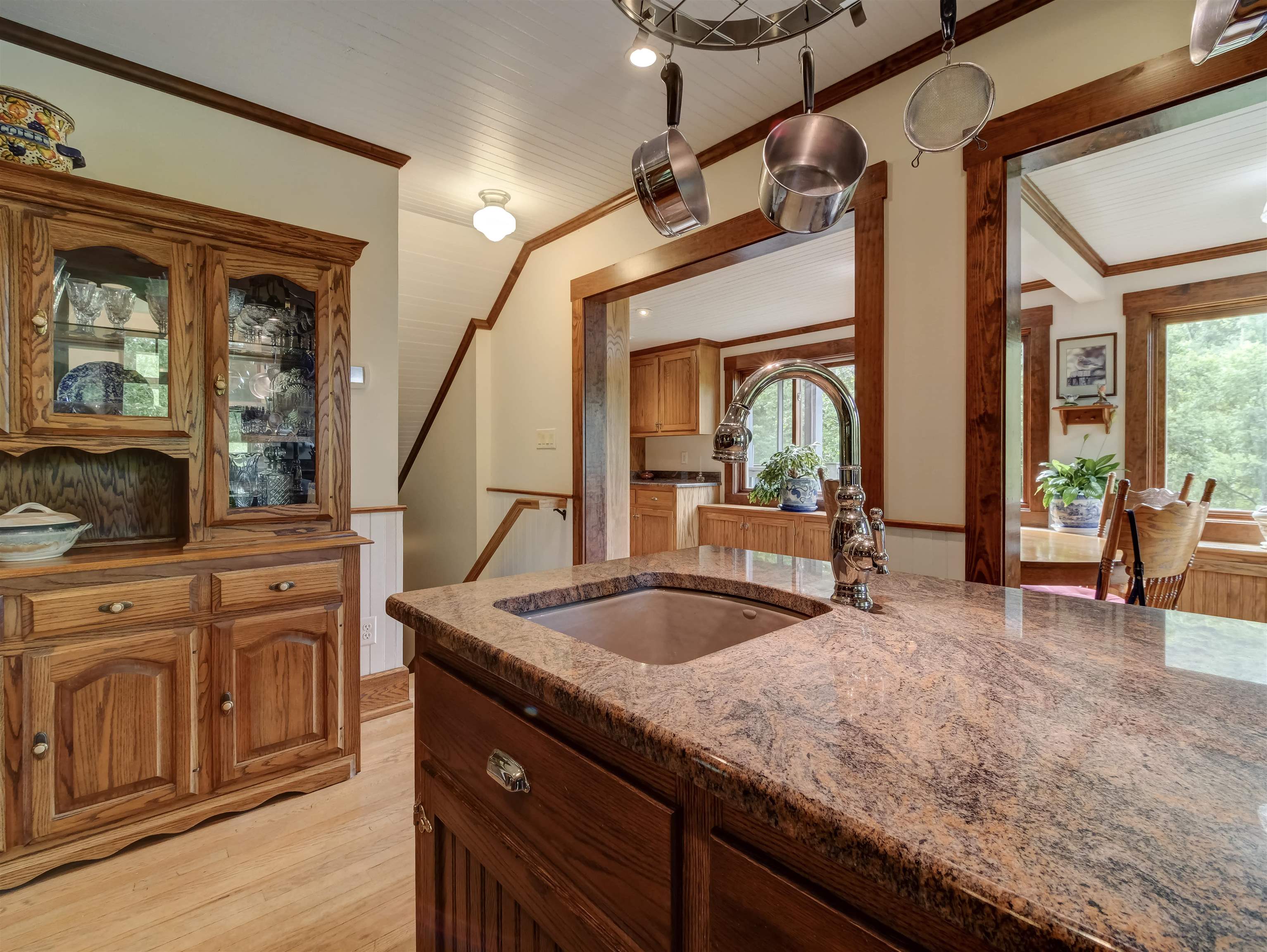 7304 Dry Run Road Williamsville, VA 24487 - Photo 26 of 57 a bathroom with a granite countertop sink and a large mirror