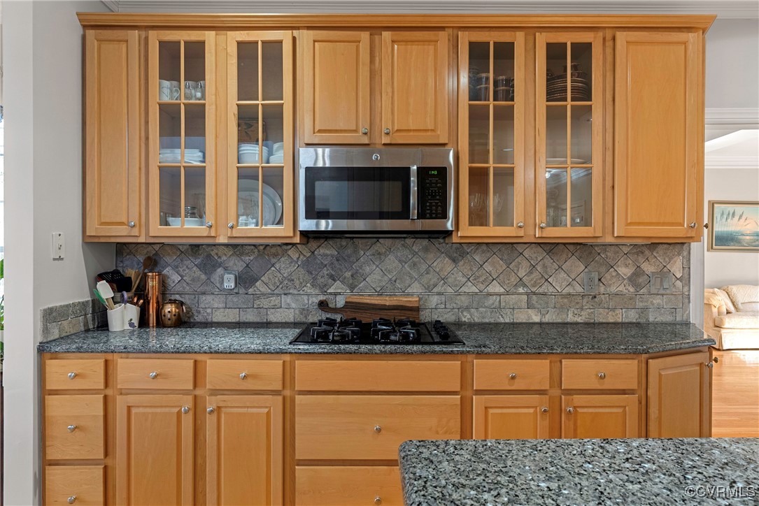 9134 Stephens Manor Drive Mechanicsville, VA 23116 - Photo 12 of 44 Kitchen with black gas stovetop, granite counters,