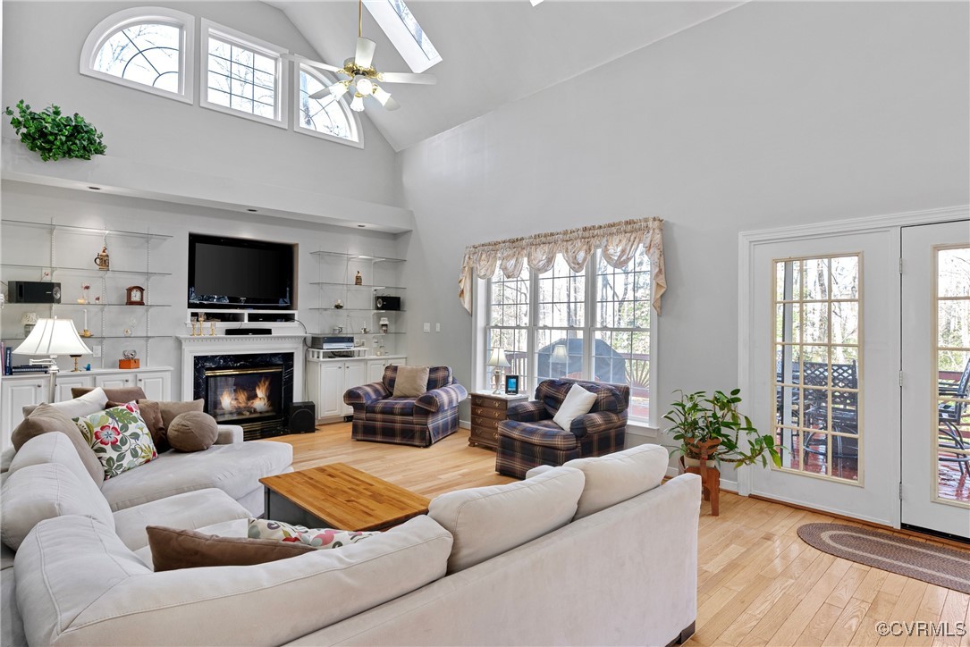 9134 Stephens Manor Drive Mechanicsville, VA 23116 - Photo 19 of 44 Living room featuring ceiling fan, a high end fire