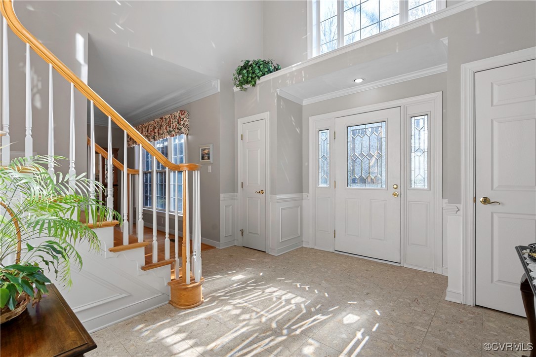 9134 Stephens Manor Drive Mechanicsville, VA 23116 - Photo 3 of 44 Entryway with crown molding and a towering ceiling